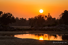 Sonnenuntergang über dem Banjar Fluss