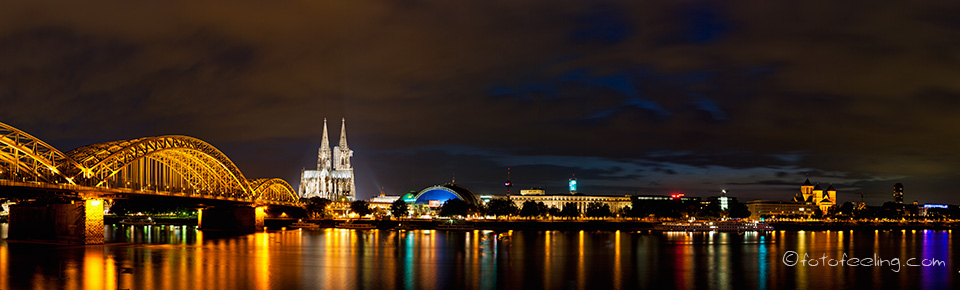 Hohenzollernbrücke über dem Rhein, Kölner Dom, Musical Dome, Alte Bahndirektion, St. Kunibert (romanische Basilika), Köln